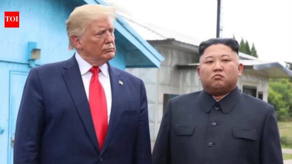 ‘Unfriendly look, but we get along great’: Trump posts old photo with Kim Jong Un