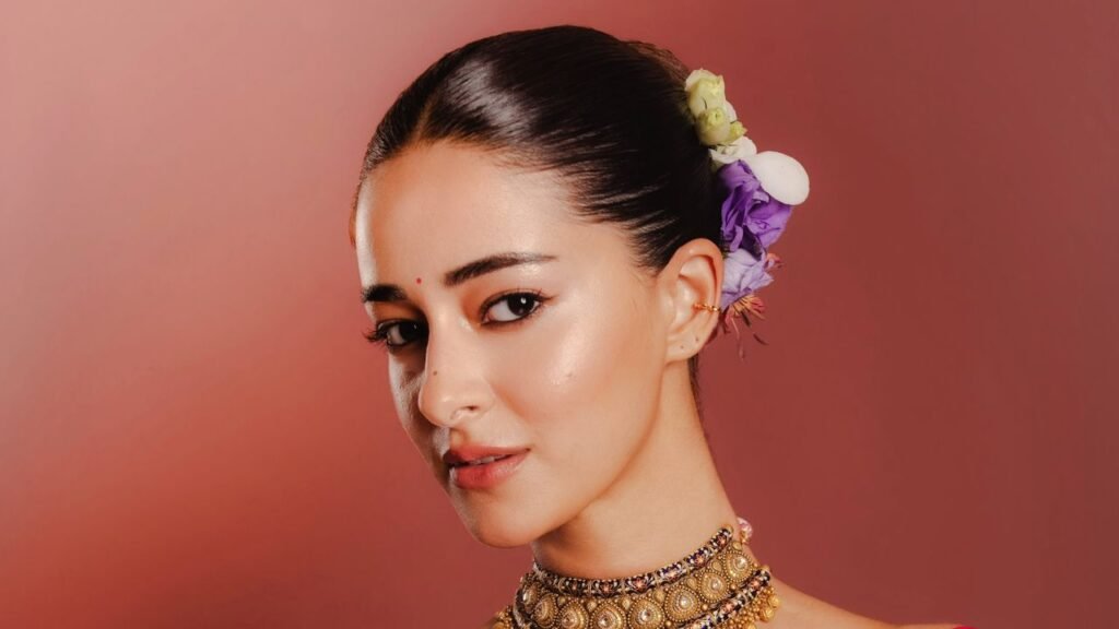 Ananya Panday wore Manish Malhotra’s royal blue Paithani sari with peacock buttis in zari and zardozi borders